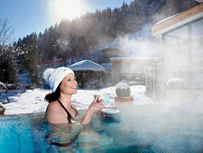 Wellnessurlaub - Entgiftungsmassage - Mühlen in Taufers - 32° Infinity Outdoorpool - Alpin Family Resort Seetal****s