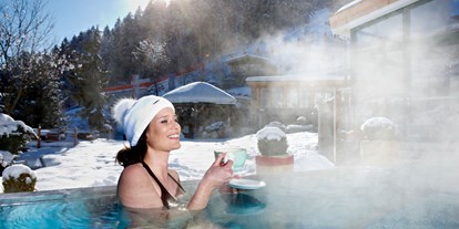 Wellnessurlaub - Ganzkörpermassage - 32° Infinity Outdoorpool - Alpin Family Resort Seetal****s