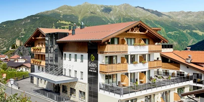 Wellnessurlaub - Bettgrößen: Doppelbett - Plangeross - Außenansicht Sommer - Alpine Hotel Resort Goies