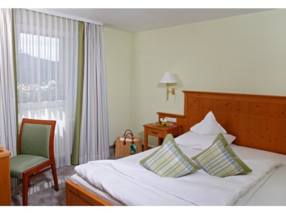 Wellnessurlaub - Hotel-Schwerpunkt: Wellness & Golf - Enzklösterle - Zimmerbeispiel - Waldhotel Grüner Baum