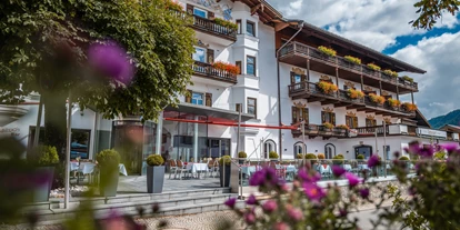Wellnessurlaub - Parkplatz: gebührenpflichtig beim Hotel - Samerberg - Hotel Unterwirt mit Sonnenterrasse - Hotel Unterwirt