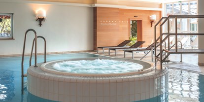 Wellnessurlaub - Hotel-Schwerpunkt: Wellness & Skifahren - Whirlpool - Hotel Unterwirt
