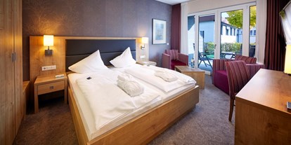 Wellnessurlaub - Rücken-Nacken-Massage - Kassel - Zimmerbeispiel Komfort-Doppelzimmer Villa Quisisana  - Göbel's Hotel Quellenhof