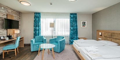 Wellnessurlaub - Rücken-Nacken-Massage - Hessen - Zimmerbeispiel Standard-Doppelzimmer - Romantik Hotel Stryckhaus