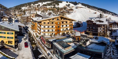 Wellnessurlaub - Skilift - Großarl - Außenansicht Winter - Hotel Kendler