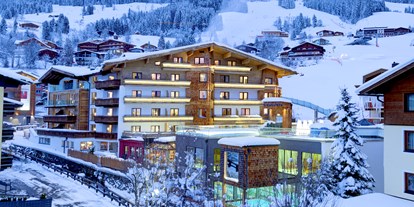 Wellnessurlaub - Infrarotkabine - Pinzgau - Außenansicht Winter - Hotel Kendler