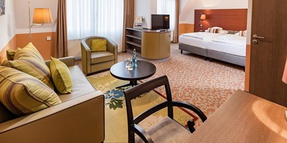Wellnessurlaub - Hotel-Schwerpunkt: Wellness & Romantik - Nörten-Hardenberg - Zimmerbeispiel Komfort-Plus-Zimmer - Göbel's Vital Hotel