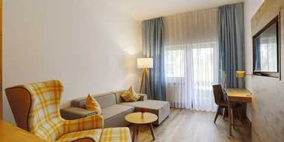 Wellnessurlaub - Hotel-Schwerpunkt: Wellness & Golf - Postmünster - Suite Wohnbereich - Das Aunhamer