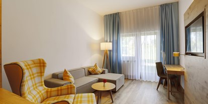 Wellnessurlaub - Hotel-Schwerpunkt: Wellness & Golf - Suite Wohnbereich - Das Aunhamer