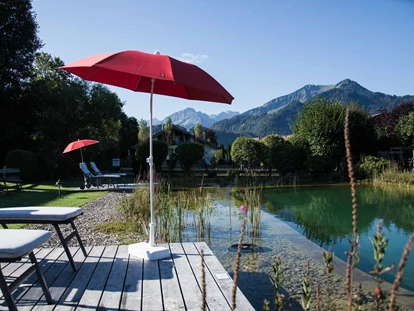 Wellnessurlaub - Aromamassage - Lauben (Landkreis Oberallgäu) - Naturpool im großen Garten - Hotel Franks