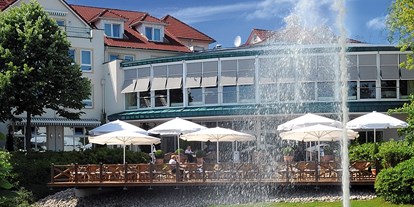 Wellnessurlaub - Außensauna - Teutoburger Wald - Terrasse & See - COURT HOTEL