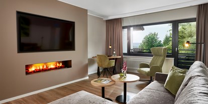 Wellnessurlaub - Komfort Suite DELUXE - Wohnbereich - Sporthotel Grafenwald