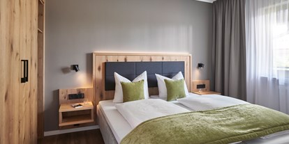 Wellnessurlaub - Komfort Suite DELUXE - Schlafzimmer - Sporthotel Grafenwald