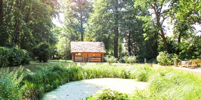 Wellnessurlaub - Finnische Sauna - Bad Düben - Hoteleigener Park, der Garten der Sinne.  - HEIDE SPA Hotel & Resort 