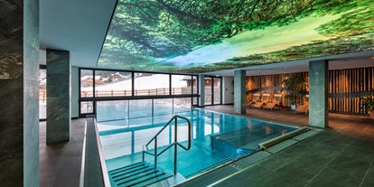 Wellnessurlaub - Pools: Infinity Pool - Döbriach - ALMGUT Mountain Wellness Hotel