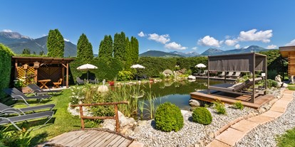 Wellnessurlaub - Pilates - Südtirol  - Naturbadeteich - Hotel Sun