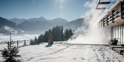 Wellnessurlaub - Außensauna - Bad Gastein - Ausblick Winter DAS.GOLDBERG - Das Goldberg