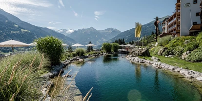 Wellnessurlaub - Pools: Schwimmteich - Grießen (Leogang) - Naturbadeteich DAS.GOLDBERG - Das Goldberg