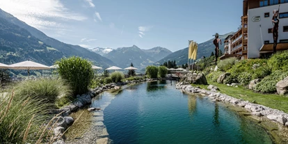 Wellnessurlaub - Pools: Schwimmteich - Grießen (Leogang) - Naturbadeteich DAS.GOLDBERG - Das Goldberg