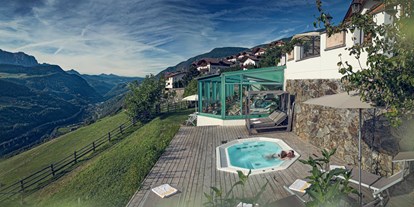 Wellnessurlaub - Kräutermassage - La Villa in Badia - Berglandhotel Untertheimerhof