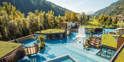 Wellnessurlaub - Pools: Schwimmteich - Völs am Schlern - Quellenhof See Lodge - Adults only