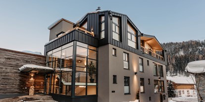 Wellnessurlaub - Hotel-Schwerpunkt: Wellness & Familie - Leogang Hütten - Hofgut Apartment & Lifestyle Resort Wagrain