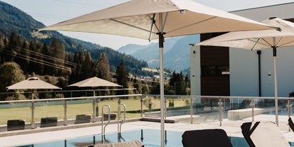 Wellnessurlaub - Pools: Infinity Pool - Kaprun Fürth - Hofgut Apartment & Lifestyle Resort Wagrain