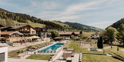 Wellnessurlaub - Pools: Infinity Pool - Kaprun Fürth - Sportbecken - Hofgut Apartment & Lifestyle Resort Wagrain