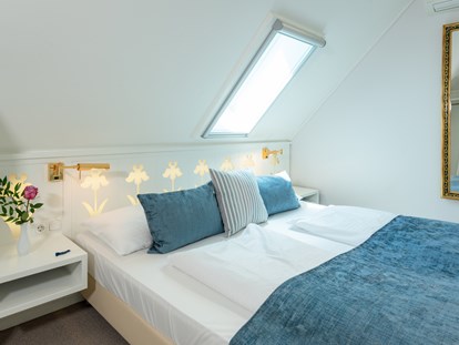 Wellnessurlaub - Bettgrößen: Doppelbett - Neusiedl am See - Bungalow A1 - Schlafzimmer - VILA VITA Pannonia