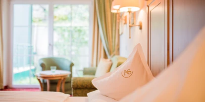 Wellnessurlaub - Wirbelsäulenmassage - Strobl - Komfortabel eingerichtete Zimmern und Suiten wohlfühlen. - Hotel AlpenSchlössl
