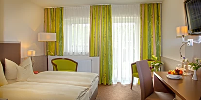 Wellnessurlaub - Hotel-Schwerpunkt: Wellness & Beauty - Pösing - DZ Clematisgarten - Hotel Herzog Heinrich