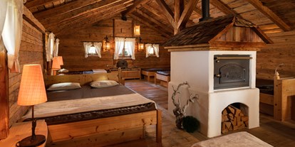 Wellnessurlaub - Finnische Sauna - Ruheraum in der "Alten Mühle" mit Wasserbetten und Brotbackofen - 5-Sterne Wellness- & Sporthotel Jagdhof