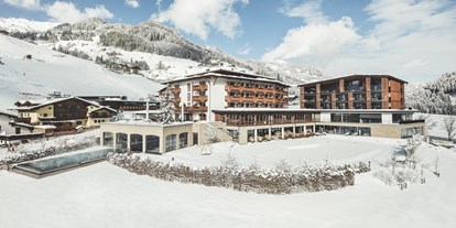 Wellnessurlaub - Kräutermassage - Hohe Tauern - Hotel Außenansicht Winter - Hotel Nesslerhof