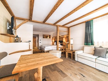 Tirler Dolomites Living Hotel  Zimmerkategorien Junior Suite Saslong