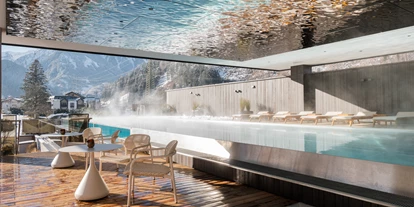 Wellnessurlaub - Pilates - Steinberg am Rofan - 25m Infinity Pool outdoor am Himmel Spa - Neuhaus Zillertal Resort