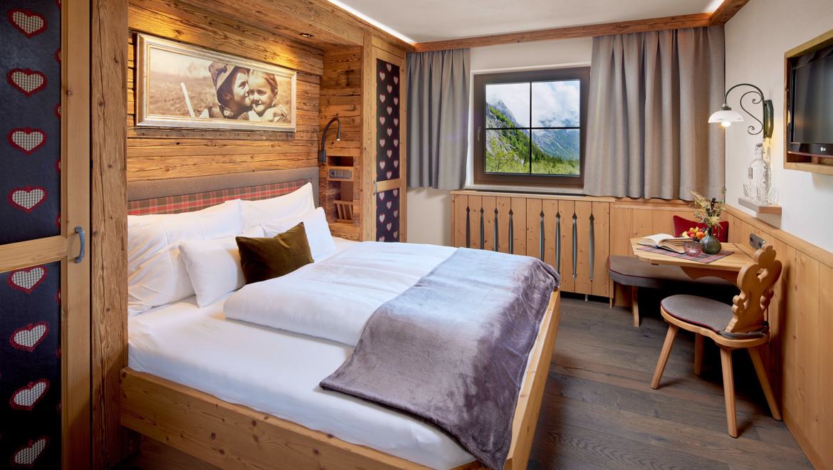 Wellnesshotel: Kuschelzimmer Morgen.Rot - Gramai Alm alpengenuss & natur spa - Zimmer | Suiten