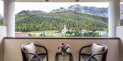 Wellnessurlaub - Pilates - Ausblick vom Balkon im Hotelzimmer - 4-Sterne-Superior Alpin Spa Hotel die Post in Südtirol