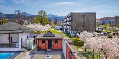 Wellnessurlaub - Finnische Sauna - Kleinlobming - Sauna Außenhof - Asia Hotel & Spa Leoben