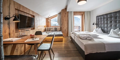 Wellnessurlaub - Babysitterservice - Wohnbeispiel Familienzimmer Landleben  - Dolomiten Residenz Sporthotel Sillian