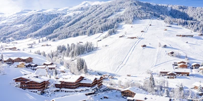 Wellnessurlaub - Fahrradverleih - Innsbruck - Winteransicht mit Einstieg ins Skigebiet - Galtenberg Resort 4*S