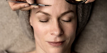 Wellnessurlaub - Dorf Tirol - Gesichtsbehandlung im Summit Beauty & Massage - Hotel Das Central - Alpine. Luxury. Life.
