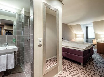 BLUME. Baden Hotel & Restaurant Zimmerkategorien Zimmer mit Queen Size Bett