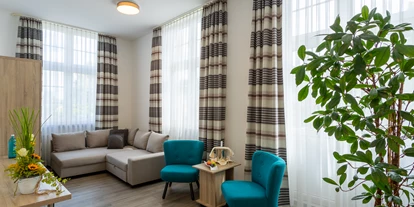 Wellnessurlaub - Finnische Sauna - Fladungen - Wohnbereich Juniorsuite - Hotel Badehof