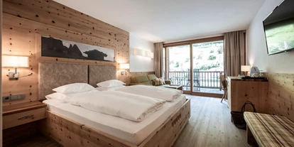 Wellnessurlaub - Oberbozen - Doppelzimmer / Familienzimmer Bergblick mit Balkon - Dolomites Nature Hotel Vigilerhof
