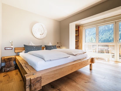 Wellnessurlaub - Fontanella - Wellnesssuite Schlafzimmer - Wellnesshotel Walserhof