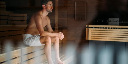 Wellnessurlaub - Ladestation Elektroauto - Eden (Glödnitz) - Panoramasauna mit Themenaufgüssen - Hotel GUT Trattlerhof & Chalets****S