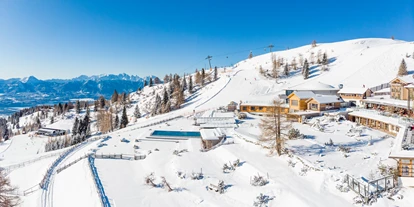 Wellnessurlaub - Ladestation Elektroauto - Eden (Glödnitz) - Auf einem Hochplateau der Gerlitzen Alpe mit Blick über ganz Kärnten bietet der Feuerberg ein unvergleichliches Urlaubserlebnis inmitten der Natur. - Feuerberg Mountain Resort