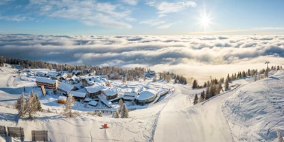 Wellnessurlaub - Ladestation Elektroauto - Eden (Glödnitz) - Traumhafter Wintertag am Resort über den Wolken - Feuerberg Mountain Resort