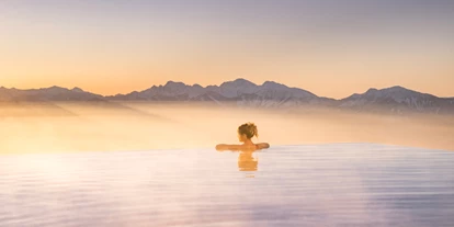 Wellnessurlaub - Ladestation Elektroauto - Eden (Glödnitz) - Sonnenaufgang im Unedlichpool genießen - Feuerberg Mountain Resort
