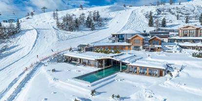 Wellnessurlaub - Ladestation Elektroauto - Eden (Glödnitz) - Das Mountain Resort Feuerberg - direkt an der Skipiste gelegen - Feuerberg Mountain Resort